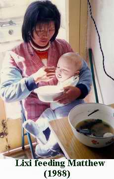 Lixi carrying Matthew in 1988. The two were inseparable for the first few years! Amoy Magic--Guide to Xiamen and Fujian. Http://www.Amoymagic.com Xiamen tourism, travel, study